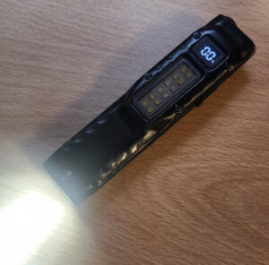 T27 Slimline Tactical EDC Torch showing LED Display
